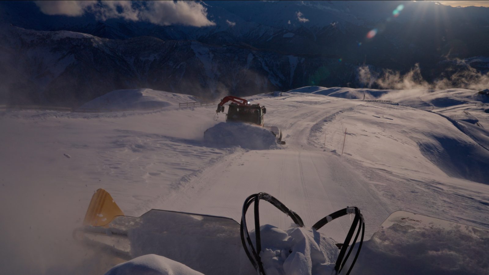 Catski at sunset — snowcat pushing up the Tetnuldi ridge road
