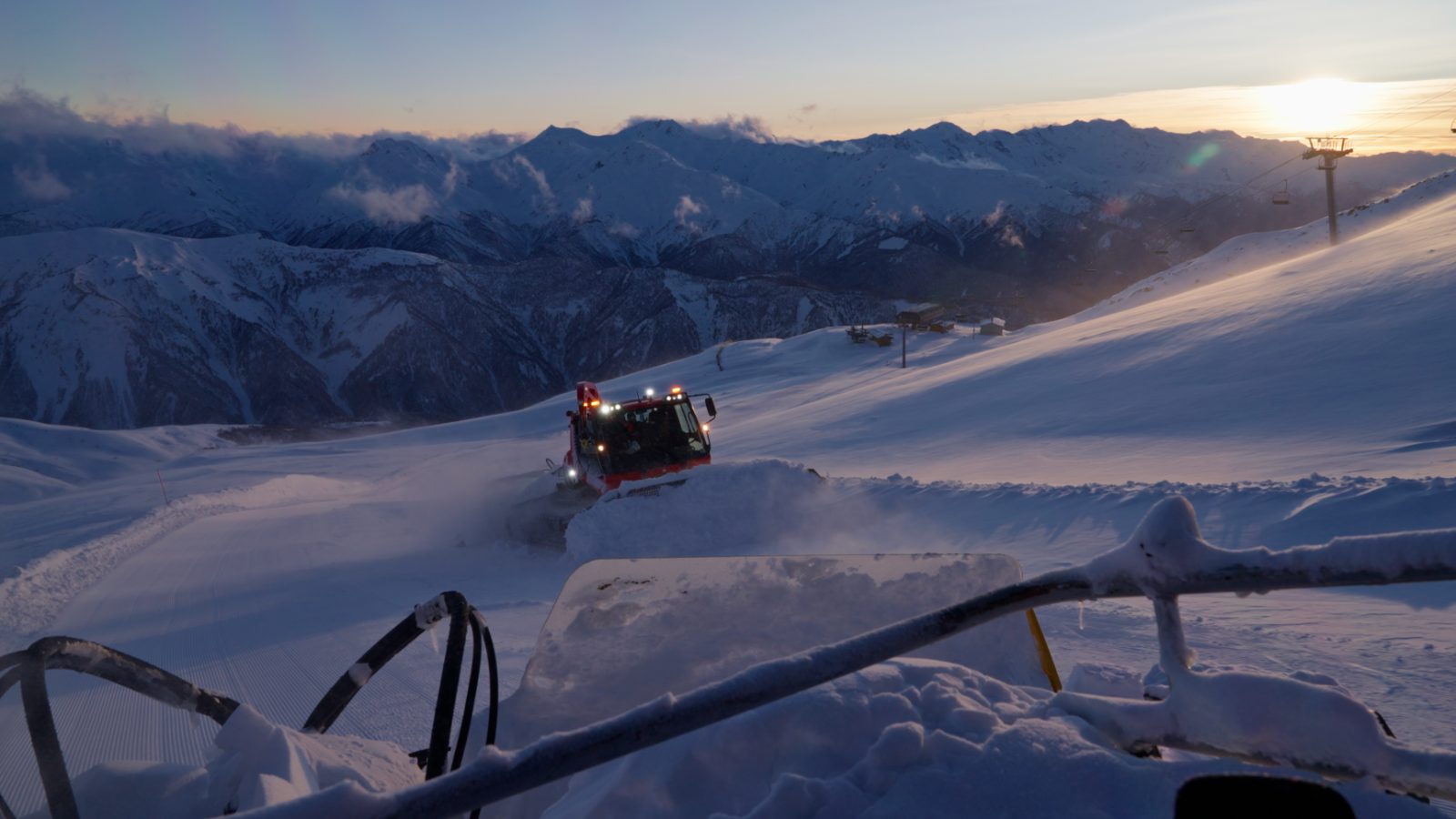 Catski on Tetnuldi — snowcat at first light on the ridge road