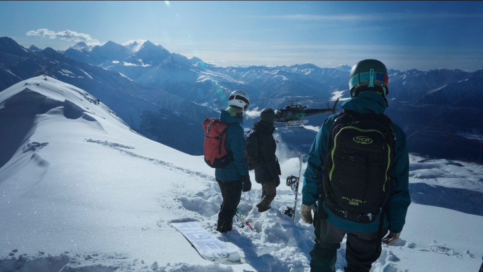 Heli-skiing in Svaneti, Georgia — helicopter drop-off on a summit ridge above Mestia
