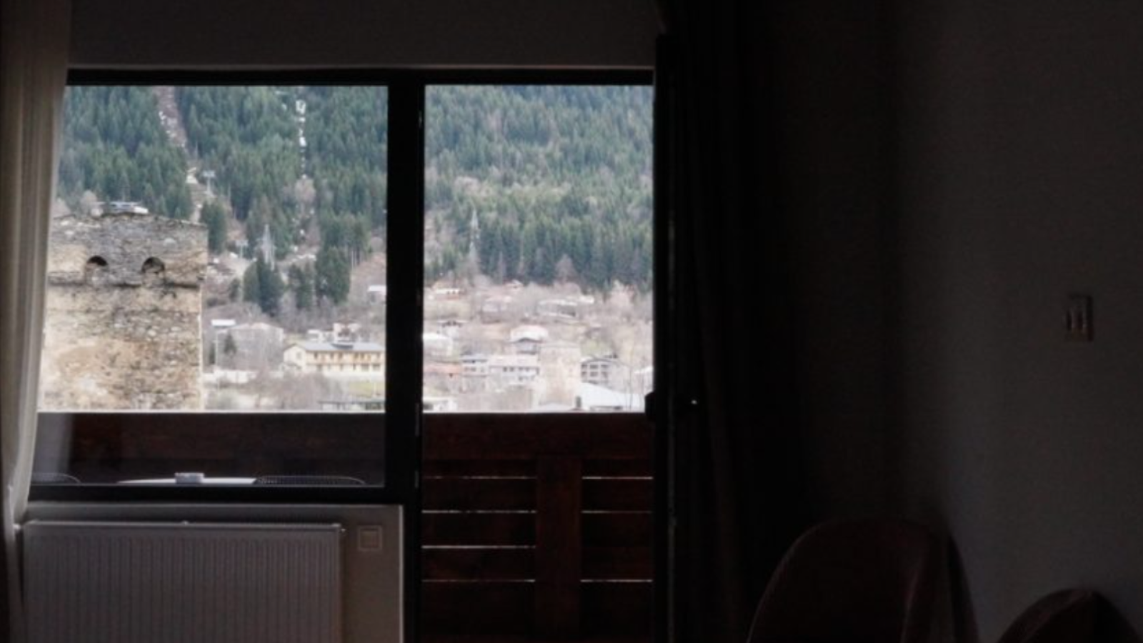 Twin room with a Svan tower view from the window — Mestia hotel