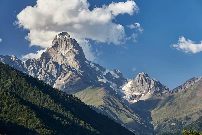 Ushba above a green valley