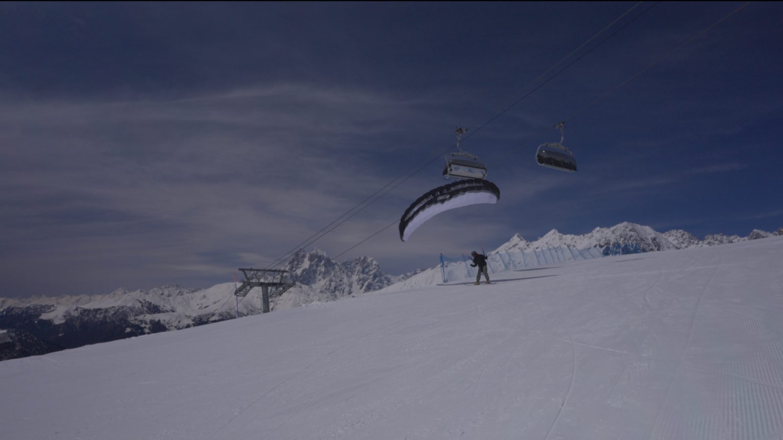 Ski launch under the chairlift line — winter paragliding above Mestia