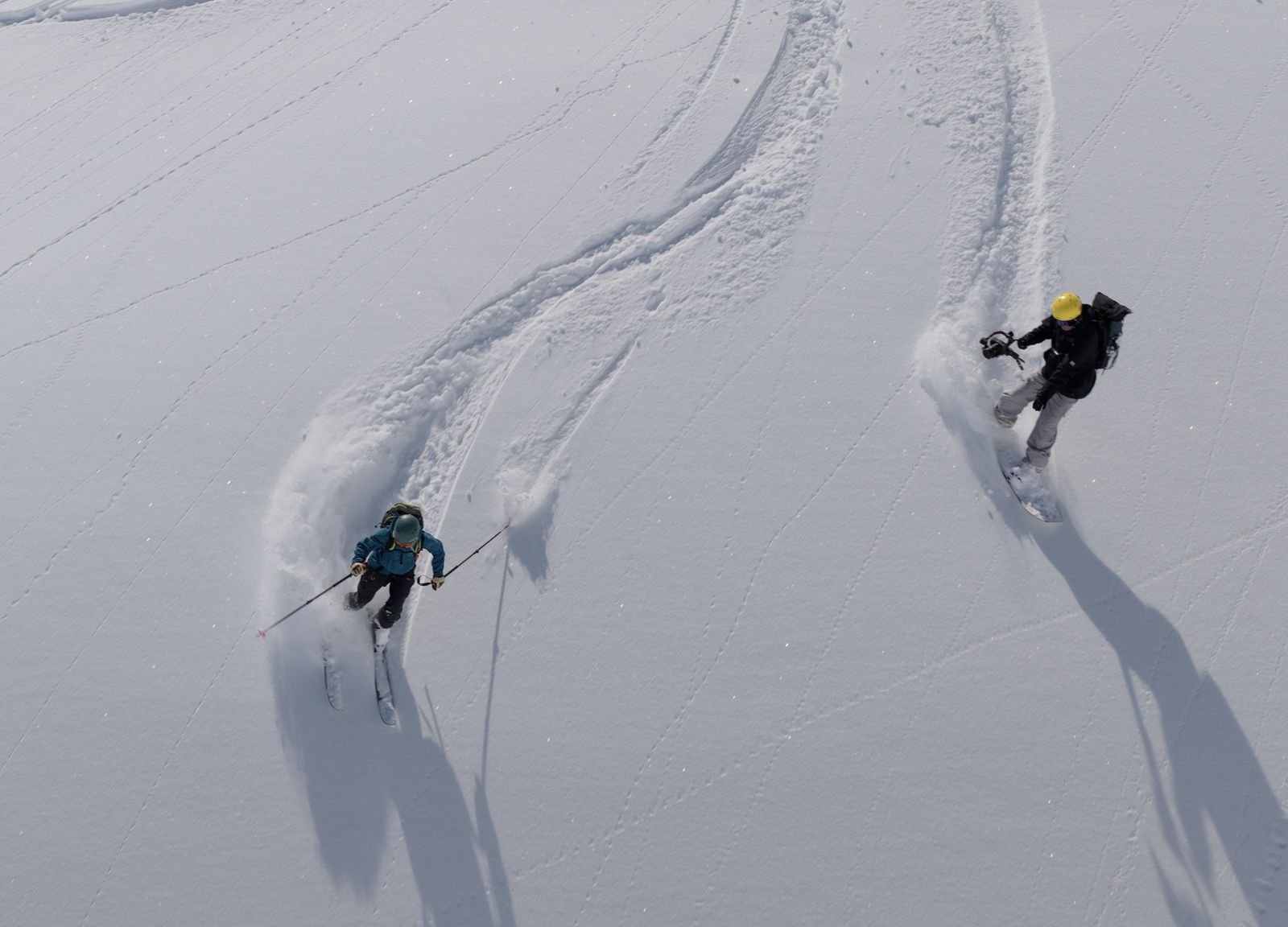Two fresh tracks in untouched powder