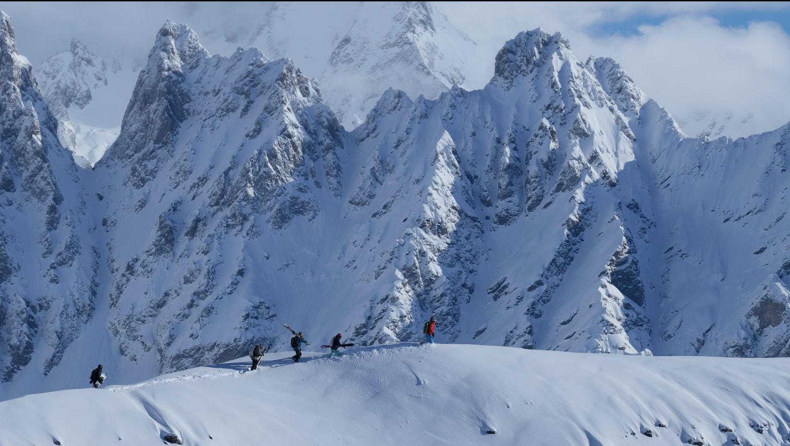 Line of ski tourers along a ridge in Svaneti