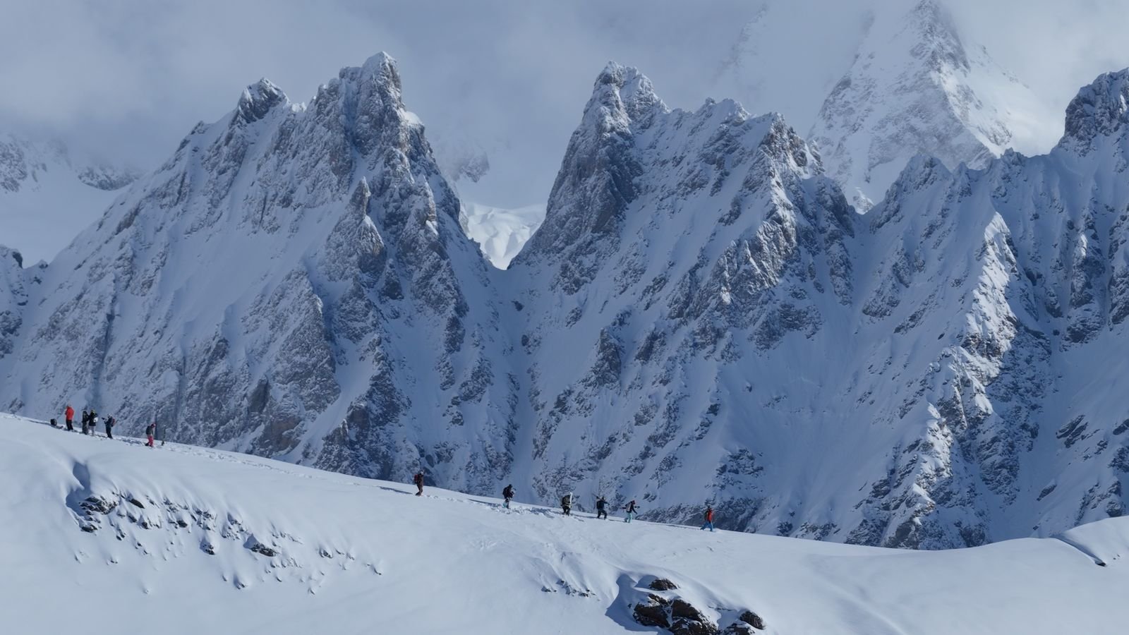 Group skinning up towards the Caucasus peaks