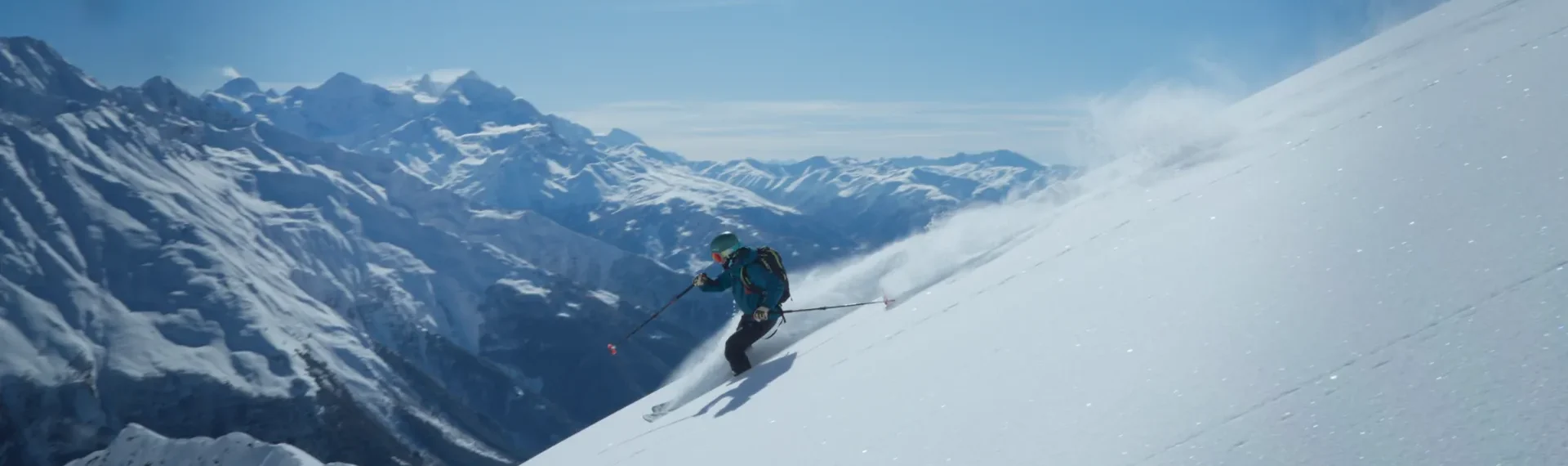 Freeride skier on an untracked open slope near Ushguli, Svaneti