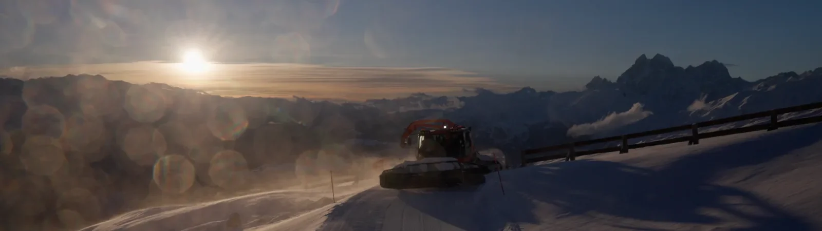 Snowcat lifting skiers to the Koruldi ridge off-piste, Svaneti, Georgia